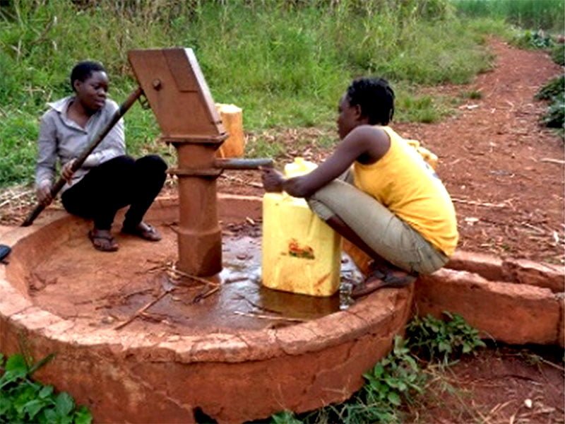 Global Village children's Project Noel and Louisa Fetch Water